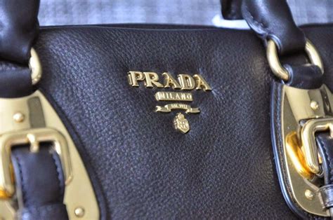 portafoglio prada fake|real prada bag.